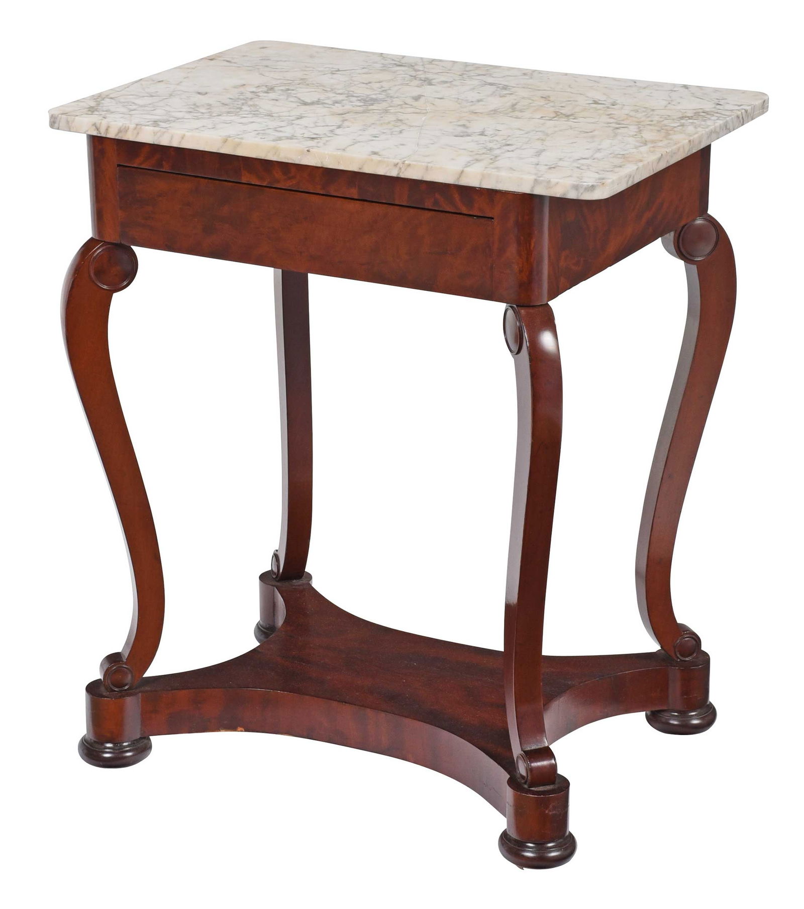 American Late Classical Figured Mahogany Work Table: circa 1830-1840, attributed to Duncan Phyfe, New York, associated marble top, figured frieze, heavily scrolled supports with circular medallions, shaped plinth, disc feet, 30 x 24 x 19-1/2 in. Provena