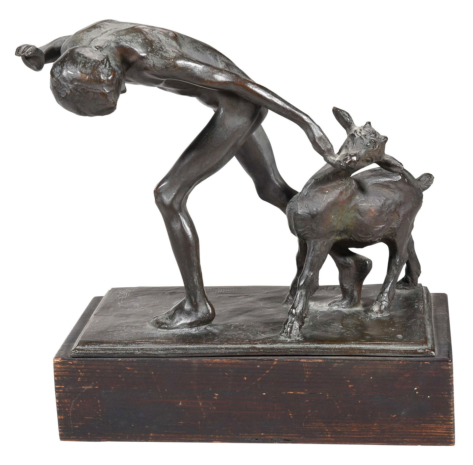 Jeno Juszko Sculpture: (American/Hungary, 1880-1954) Boy with Goat, signed on bronze base "J. Juszko", patinated bronze, 11 x 6 x 10-1/4 in., on a painted wood plinth, 3 x 6 x 12 in. Provenance: Collection of Ben Schecter a