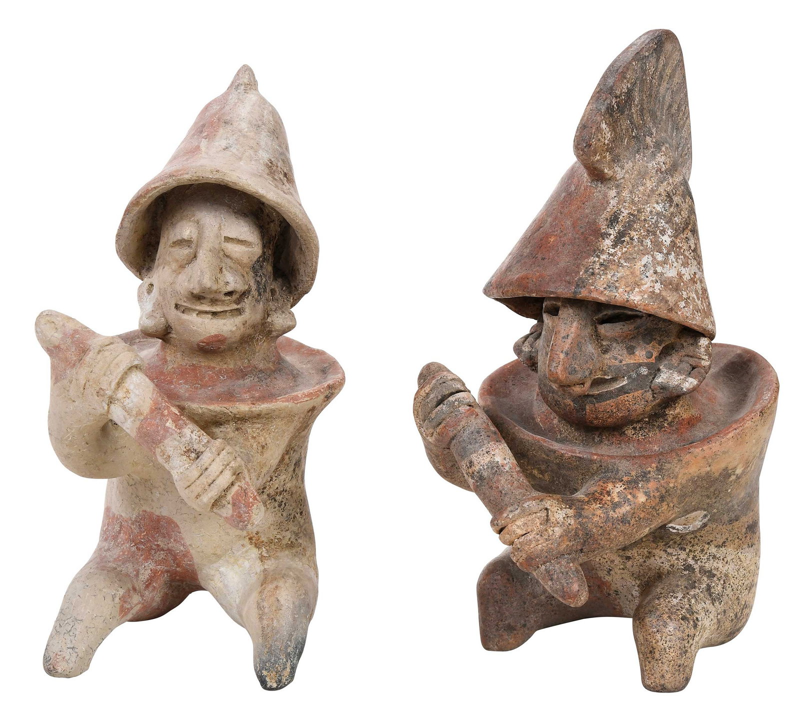Two Jalisco Style Pottery Warriors: each in conical helmet and barrel armor, holding clubs, with painted details, larger 8-3/4 x 3-7/8 in. Provenance: Private Collection, Virginia