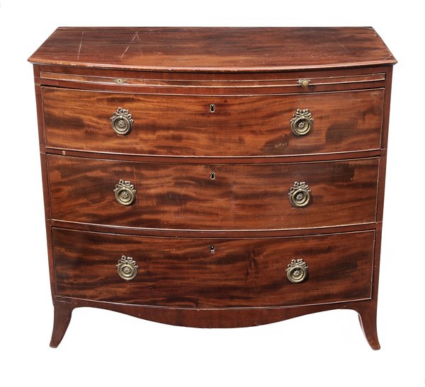 Hepplewhite Figured Mahogany Bow-Front: Chest British, 19th century, dovetailed drawers with oak linings, pull-out brush slide, original French feet, 35-1/2 x 40 x 23 in., restorations to foot and skirt blocking, veneer repairs with color r