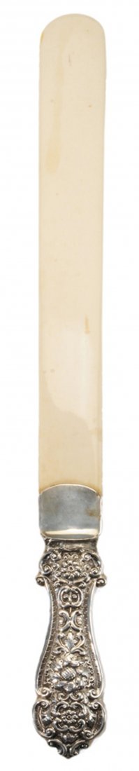 English Silver Page Turner: London, 1894, silver scroll, floral and acanthus handle, ivory blade, marks for Henry Wilkinson & Co. Ltd., no monogram, .925 fine, 20 in., repaired handle Provenance: Private Collection, Georgia