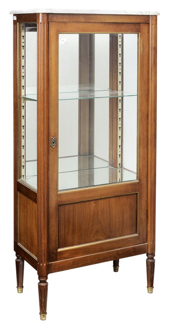 [Directoire] Style Marble-Top Vitrine: 20th century, mahogany with brass mounts and mirrored interior, variegated white marble top, 56-3/4 x 27 x 15 in., bottom mirror plate with cracks, minor edge wear to marble, some sun fading and other