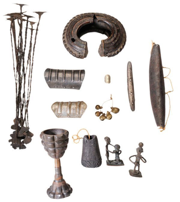 Large Group Tribal Objects: African and other cultures, 20th century: several bracelets, rings, anklets, small bronze bells, grenade chalice, large bronze cup, other objects, in various metals with object of carved stone, large
