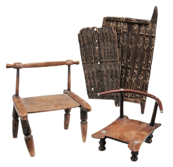 Two Tribal Carved Wooden Doors, Two: Chairs African, 20th century: Dogon(?) doors with figural relief decoration, 23 in., [extensive cracks, wear and losses;; together with two side chairs, 14 and 22 in., [smallest with break at rear sti