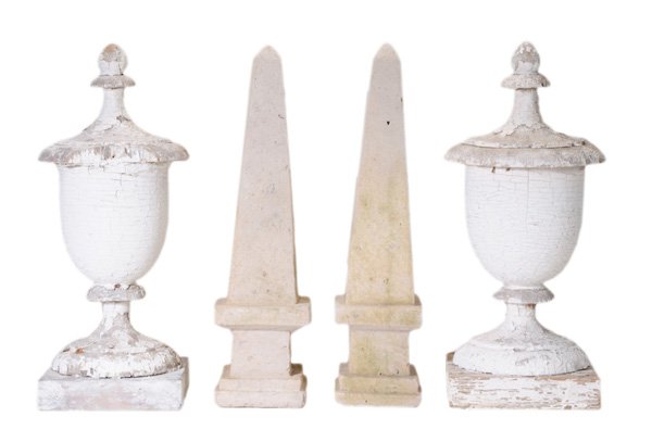 Pair Painted Wooden Urns with Pair: Stone Obelisks early 20th century: pine architectural urns in white paint, 17 in., [large losses at rims and bases, extensive paint losses, wear;] cast stone or limestone obelisks, 17 in., [some surfa