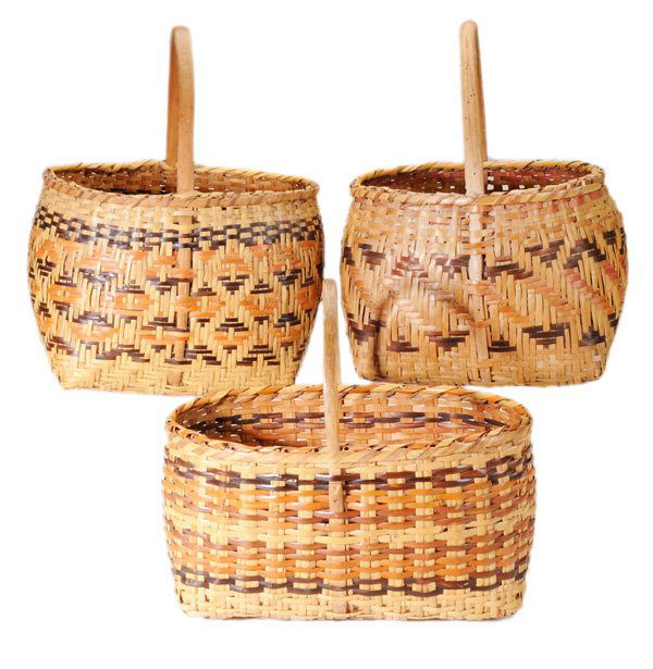 Three Cherokee River Cane Baskets: early 20th century, each with bentwood handle and geometric design, ranges from 11 in. to 14 - 1/4 in. tall, generally good condition, one with breaks and losses to rim wraps, other base and corner we