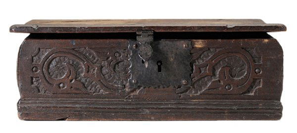Early English Oak Bible Box: 17th or 18th century, 6 x 18 x 11 in., replaced hinges and lock, lid warped and with crack and repair, other scattered cracks, stains and wear Provenance: Private Collection