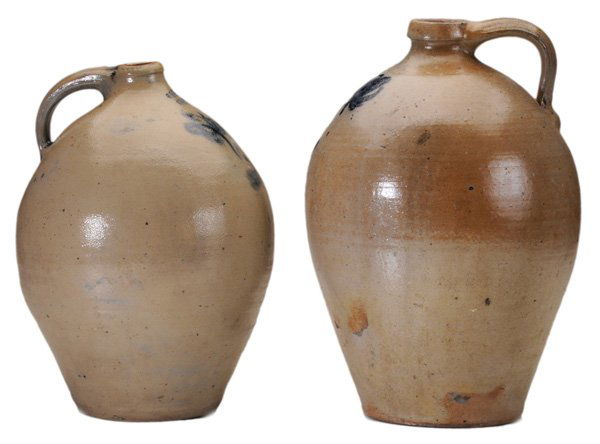 Two Large Blue-Decorated Stoneware: Jugs American, 19th century: one with stamped signature "G. Lent, Troy", 13-3/4 in., [firing flaws, surface wear and blisters;] one marked with "3", 15-1/2 in., [good condition overall, surface crazin