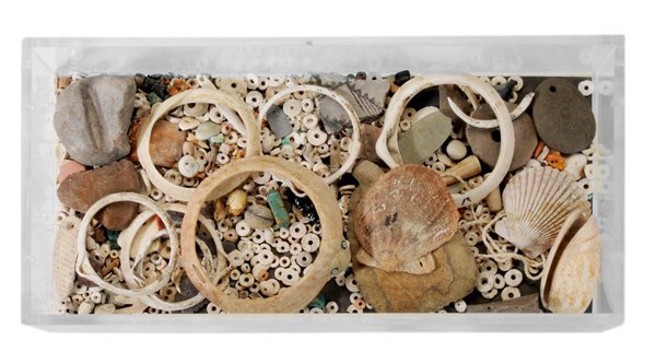 Large Assortment Pre-Columbian Shell: Bracelets, Beads and Artifacts various cultures and ages: including large shell bracelet with inset turquoise eyes, and six other shell bracelets, pendants, pottery shards and other artifacts, display