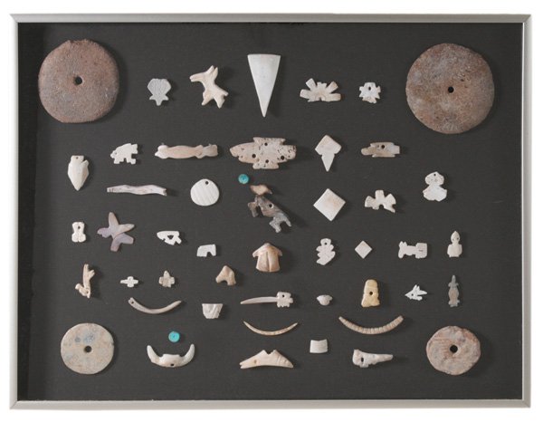 Collection of Native American: Artifacts probably Hohokam, prehistoric, shell and ceramic beads, gaming pieces with animals including frog, birds, lizards and other critters; framed as a collection, not examined out of frame, losse