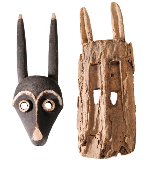 Two Carved Wood Tribal Masks: African, 20th century, Pende and Dogon cultures, 16 x 5 in.; 16 x 6 in.,