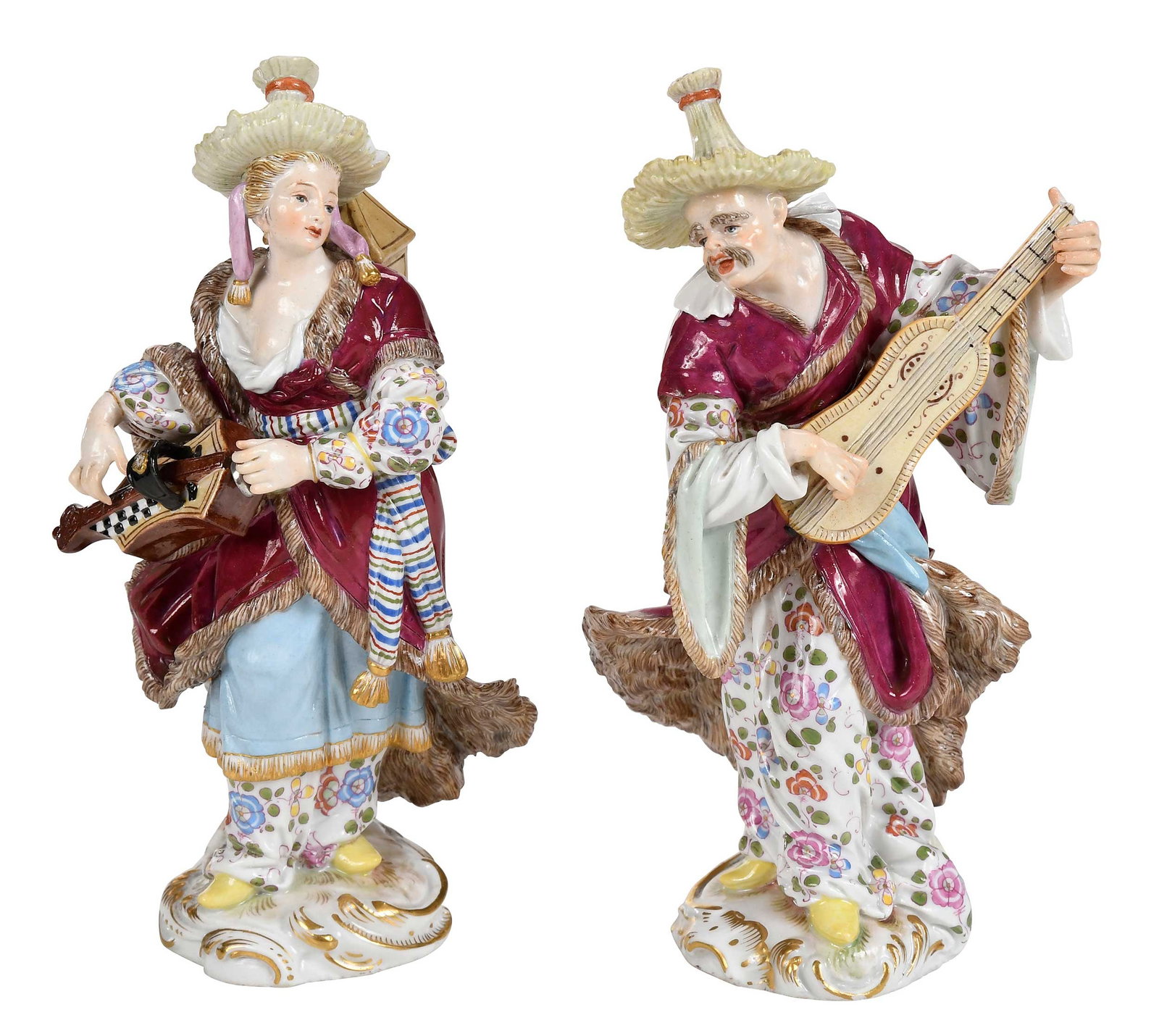 Pair of Meissen Porcelain Figures, Malabar Musicians: German, possibly 18th century, each with crossed swords mark to base, enamel and gilt decoration, comprising: lady with hurdy gurdy, 6-7/8 x 3-3/8 in.; gentleman with guitar, 7 x 4 in. Provenance: The