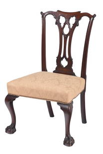 Four Philadelphia Chippendale Mahogany Dining Chairs: Pennsylvania, 1760-1780, each with finely carved back with scrolled crest rails and ears, pierced splats over the rail, upholstered seats, set on cabriole legs, through tenon construction, 39-1/2 x