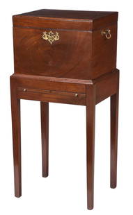 Southern Federal Mahogany Cellarette: late 18th century, hinged top opens to a divided interior, brass bail handles, lower stand with drink slide and tapered legs, yellow pine and poplar secondary wood, 41-1/2 x 20 x 16 in. Provenance: Pr