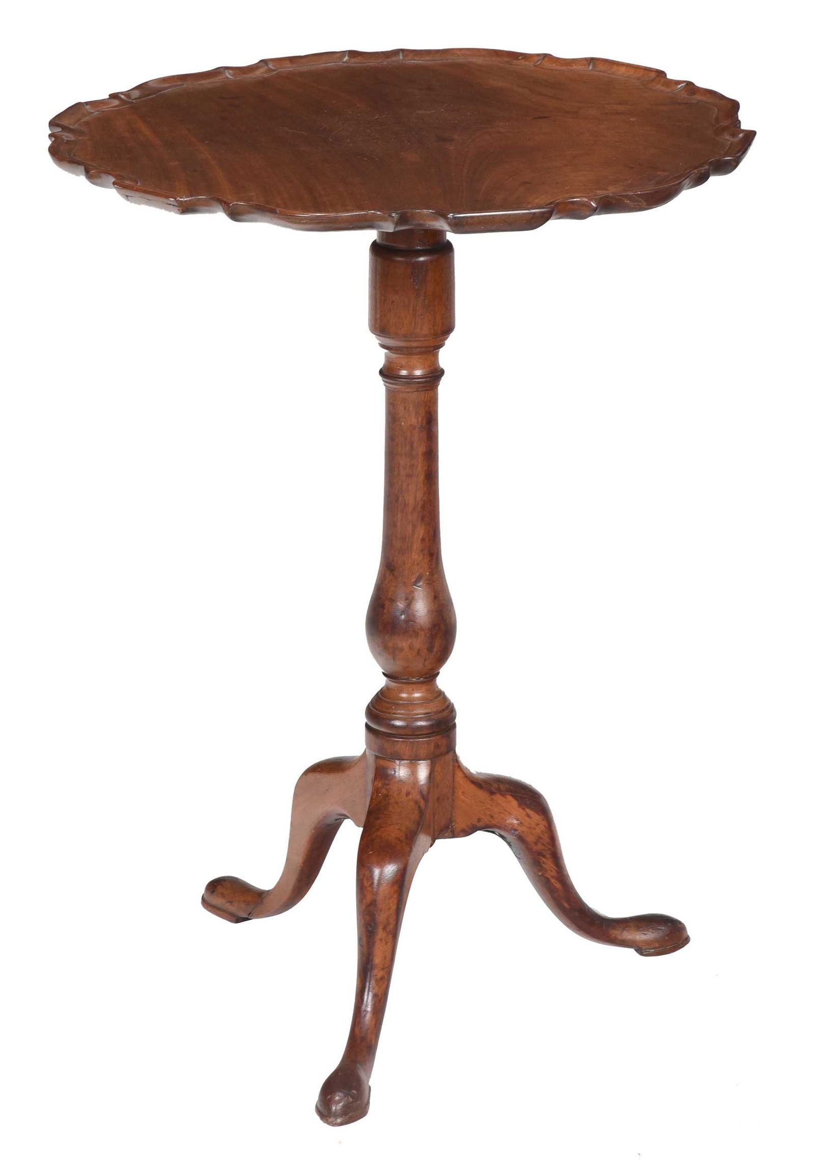 Chippendale Mahogany Pie Crust Candle Stand: 18th century, figured mahogany pie crust top tilting on a baluster turned tripod stand with slipper feet, 28-3/4 x 21-3/4 x 21 in. Provenance: Private Collection