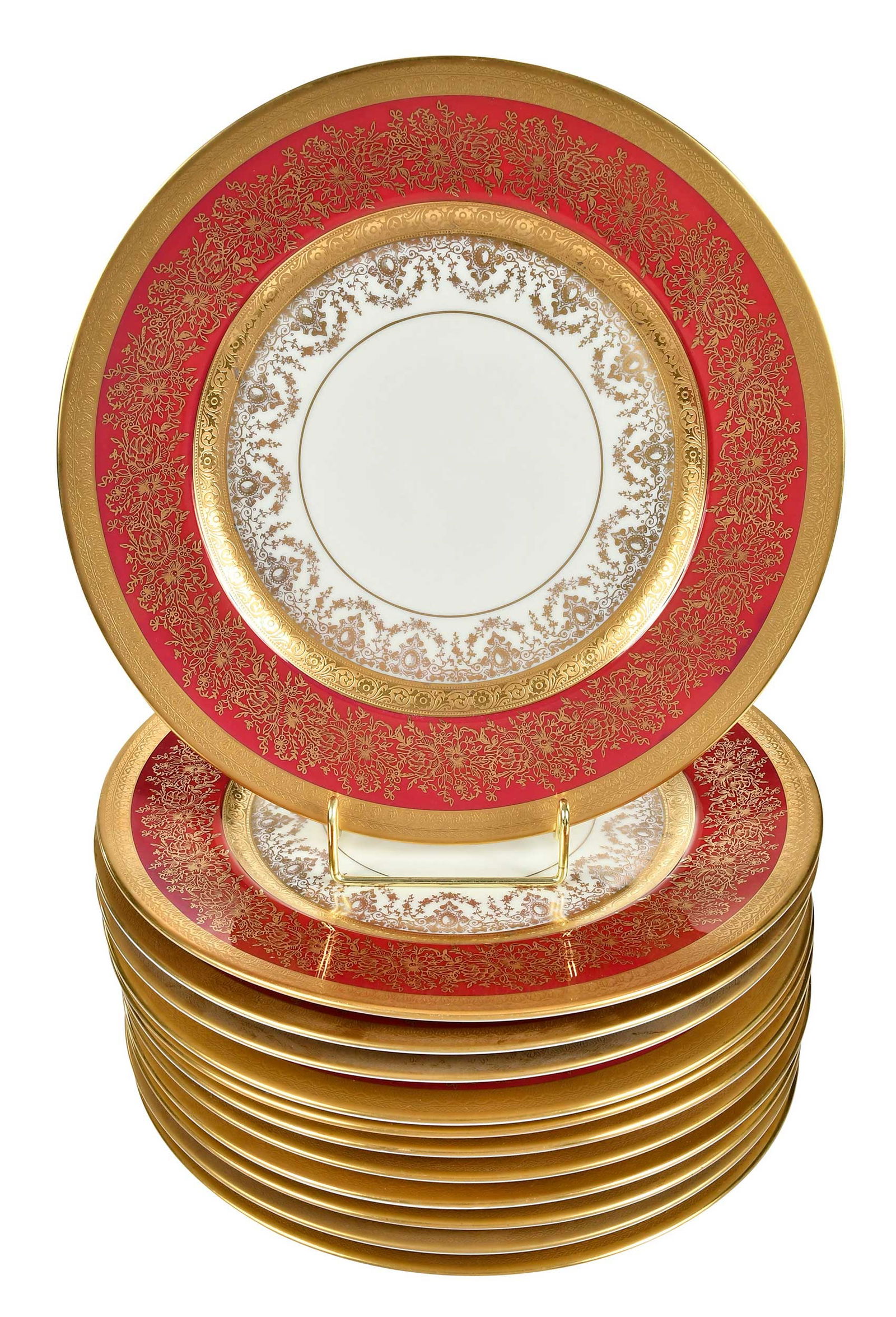 12 Heinrich and Co. Gilt Decorated Porcelain Dinner Plates: German, 20th century, marks for Heinrich & Co. and Pickard on bases, vermillion rims with gilt foliate decoration and rims, 11 in. Provenance: The Collection of Clare and Jared Edwards, West Hartford,