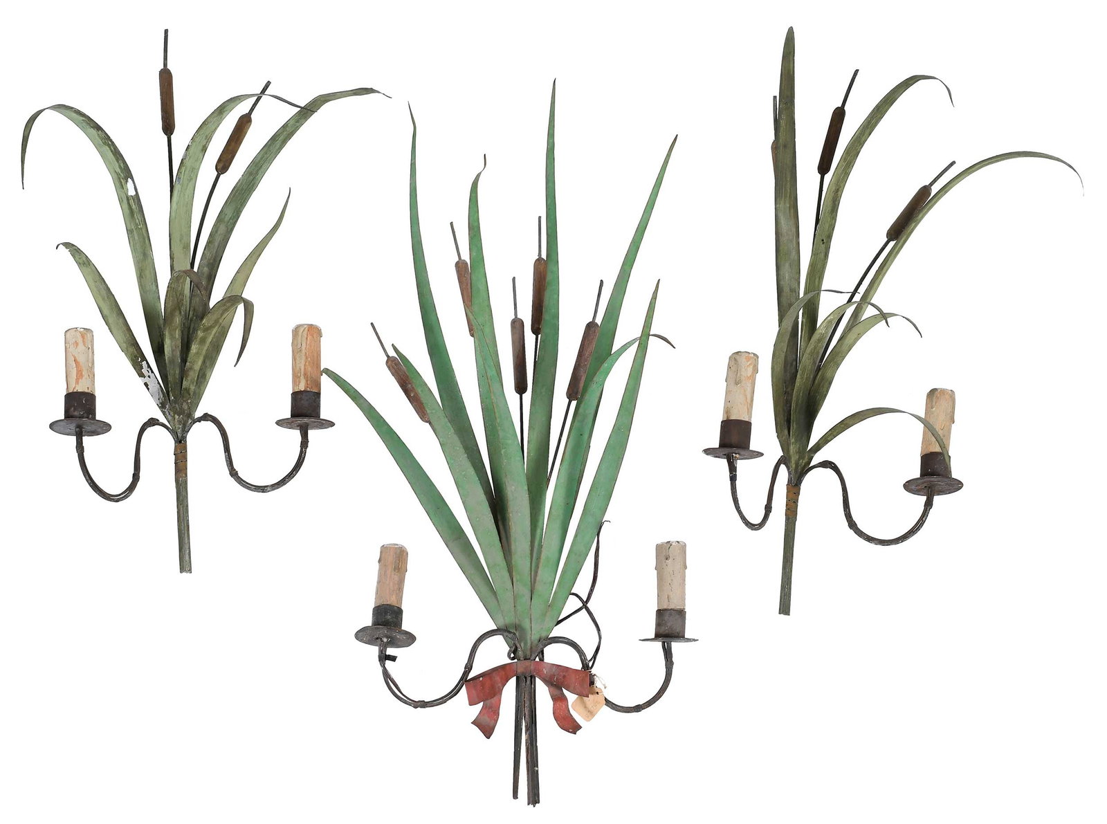 Three Tole Cattail Dual Light Sconces: wall mounted tole light fixtures, set amidst grass blades and cattails surrounding, once wired for electricity (not tested), largest 25 x 12 in. Provenance: The Collection of Clare and Jared Edwards,