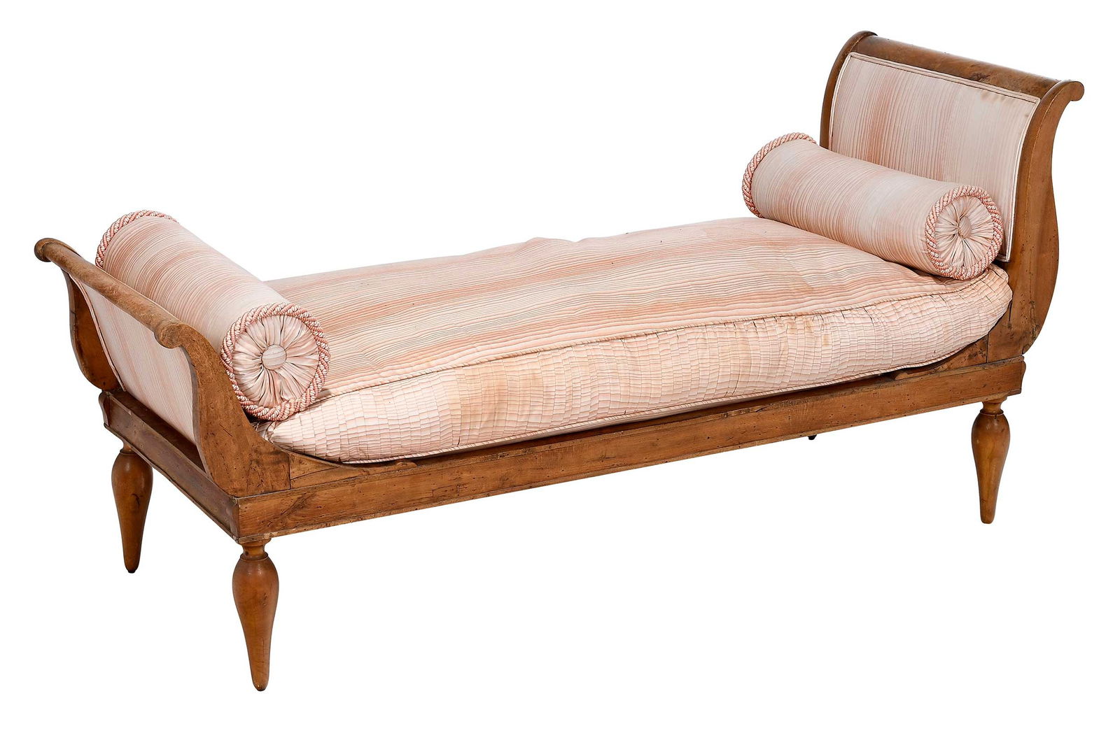 Neoclassical Figured Walnut and Beechwood Upholstered Recamier: Continental, likely Italian or German, circa 1830s, sleigh form in figured walnut with finely turned legs, loose upholstered down cushion, 31-1/2 x 65-1/2 x 24 in. Provenance: The Collection of Clare