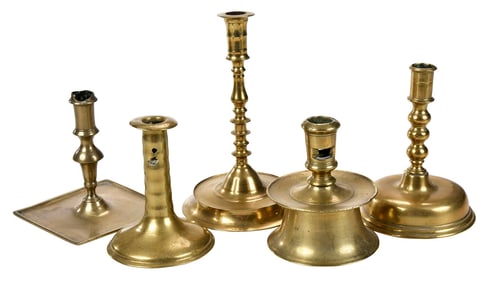 Five Early Continental Brass Candlesticks