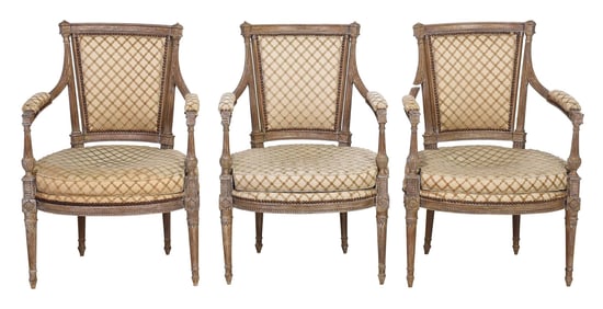 Set of Three Fine Louis XVI Carved and Upholstered Open Armchairs
