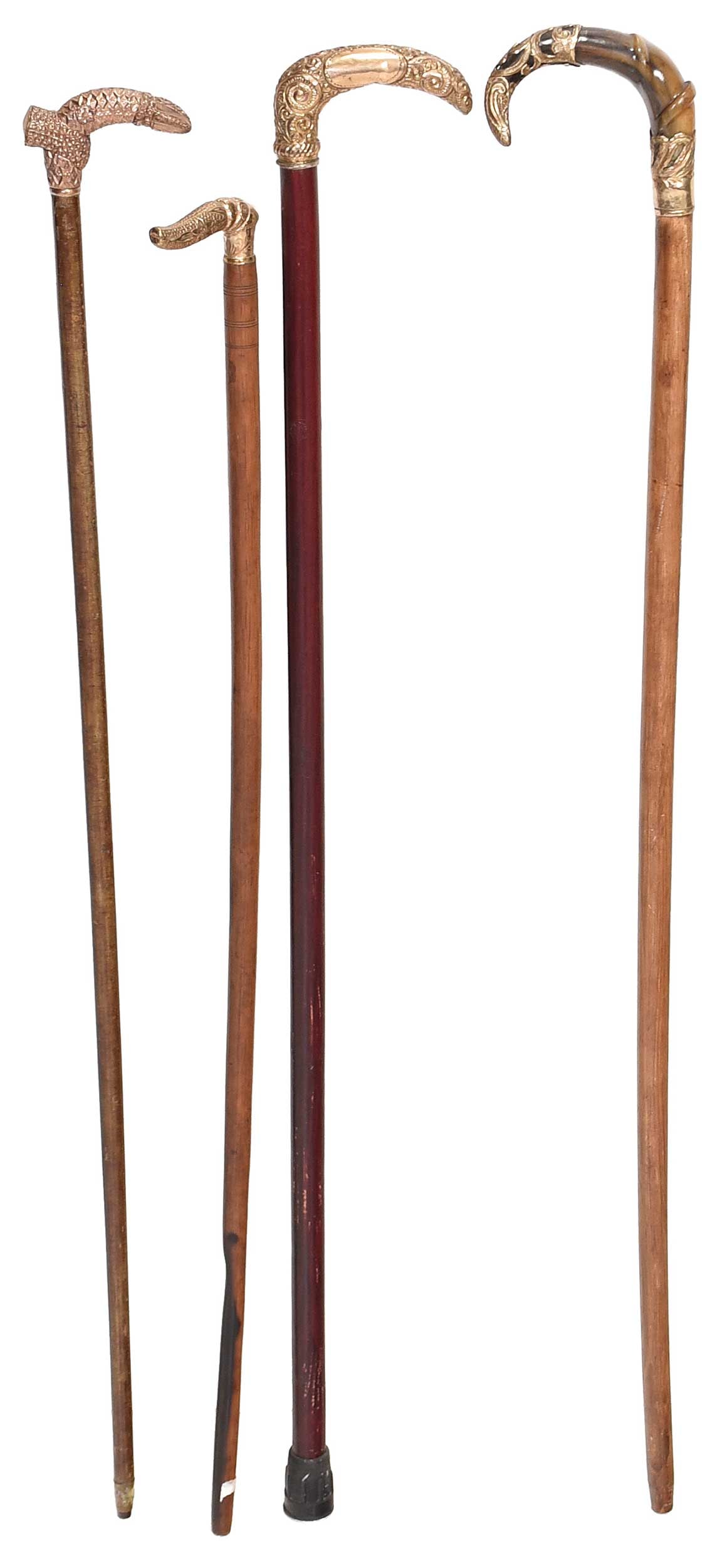 Four Turned Canes with Gilt Handles (1 of 10)