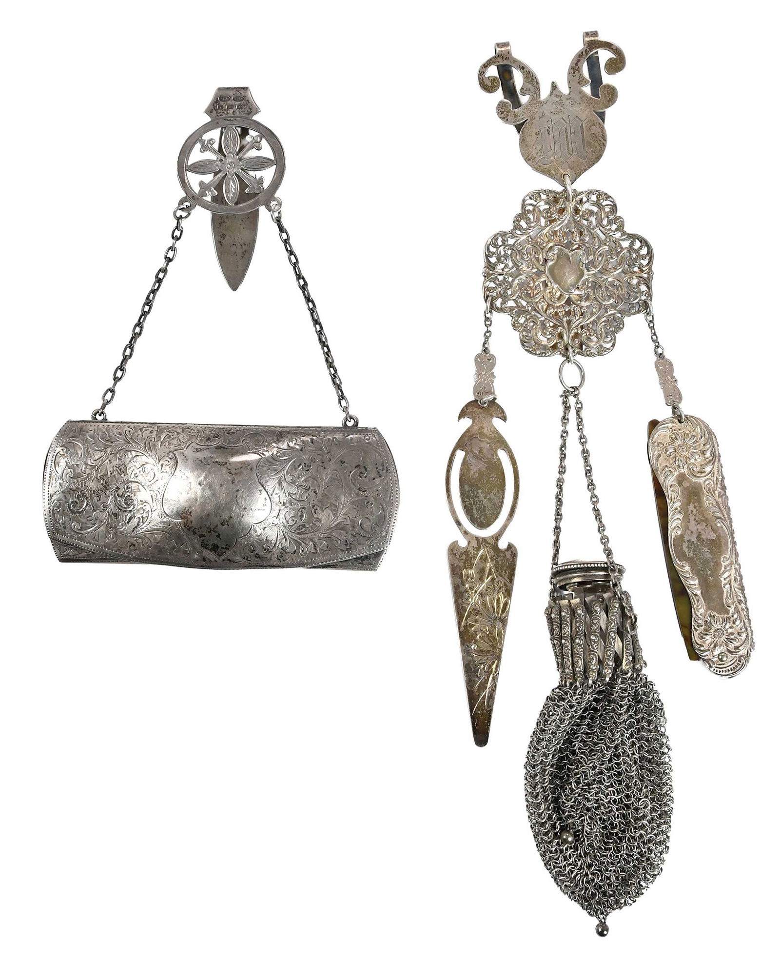 Two Silver Chatelaines with Attachments: assembled chatelaine with English silver clip, partial sterling belt buckle; silver bookmark, marked 950; sterling coin purse; folding comb with sterling case, English eyeglass case with clip, 184 gra