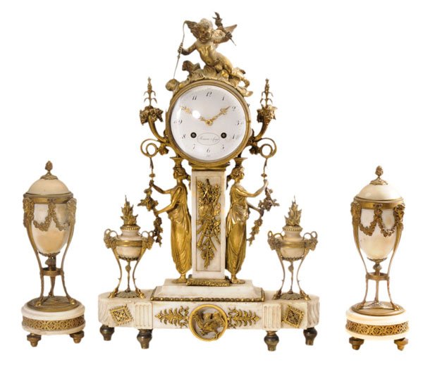 Fine French Empire Gilt Bronze and: Marble Clock Garniture the dial signed "Meuron & Comp.", early 19th century, the clock set with classical figures flanked by urns with goat's head mounts, skirt set with a cockerel, flanked by lidded 