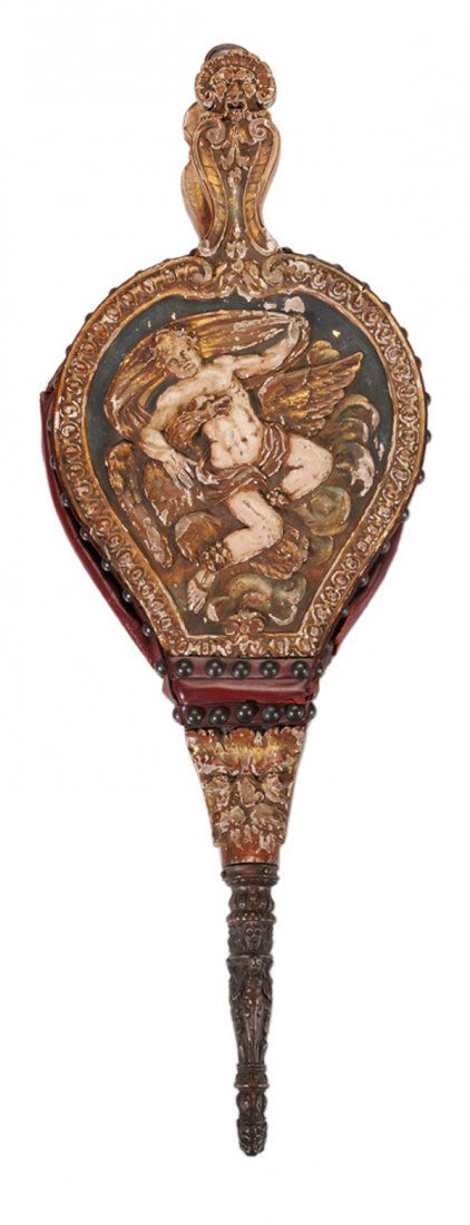 Italian Baroque Carved, Painted and: Parcel Gilt Bellows probably Venetian, 19th century, relief-carved with mask handles, top with Prometheus grappling with eagle, figural cast bronze nozzle, 30 in., leather and tacking replaced, leathe