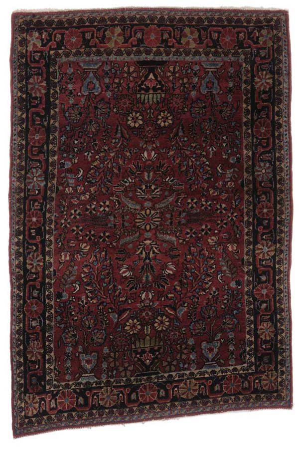 Sarouk Rug: Persian, second quarter 20th century, vase and floral designs on brick-red ground, multiple floral borders, 3 ft. 3 in. x 4 ft. 9 in., even low pile, no threadbare areas or corduroy effect found, lack