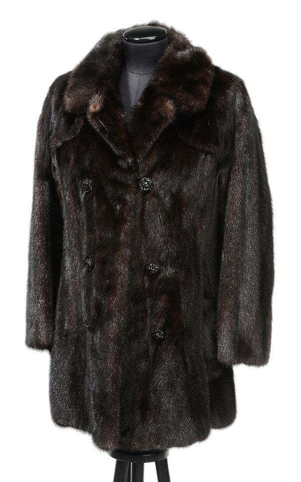 Mink Jacket: double rows of buttons with cut glass stones, interior label, "Saks Fifth Avenue", size medium, 32 in. some stones missing from buttons Provenance: Estate of the Late Vivian Wilson-Cohen, Charleston,