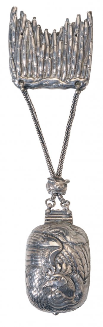 Silver Betel Nut Case: Southeast Asian, 19th century, hinged case with elaborate rooster in relief and a leaf holder with bamboo decoration, both attached with chain and bat-form toggle, no monogram, tests .900 or better, 1
