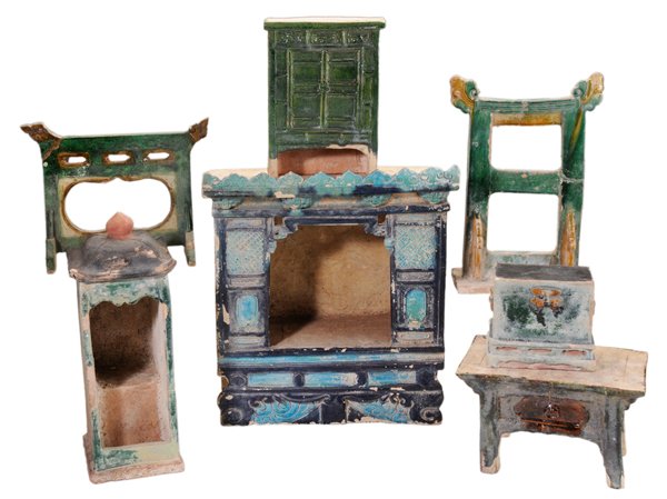 Seven Pieces Ceramic Tomb Furniture: Chinese, probably late Ming period: altar, cabinet, lift-top chest, two screens, table, stepped altar, 5 in. to 16 in., scattered chips and wear throughout, one screen with breaks and repair at finial