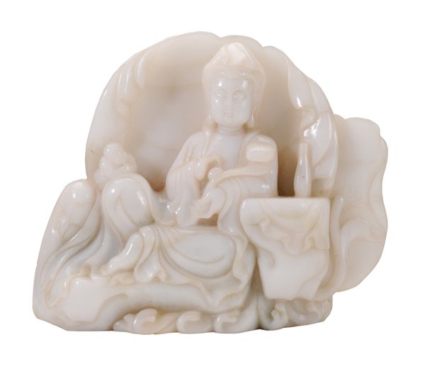 Large White Quartz Guanyin: Chinese, Qing Dynasty (1644-1911), translucent white with some celadon inclusions, Guanyin seated in a grotto with a rushing stream, a [ruyi] scepter in her left hand, a bottle to the left on a cloth-