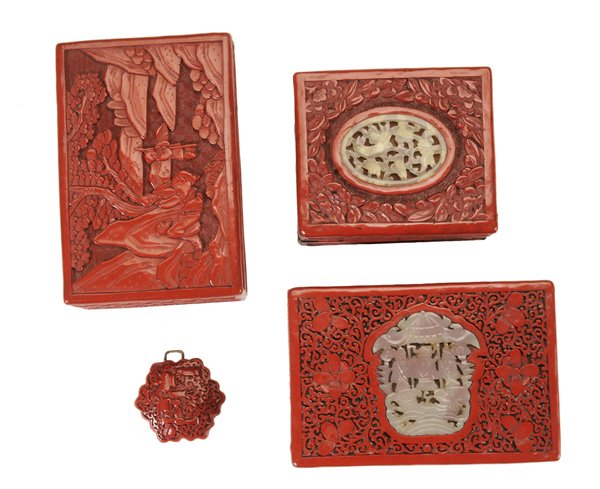 Four Pieces Carved Cinnabar: 20th century: three carved cinnabar lacquered boxes, two of the boxes with inset carved white jade or hardstone plaques, all with removable lids, largest 2 x 5-1/2 x 3-3/4 in. to 2 x 4-1/4 x 3-5/8 in.