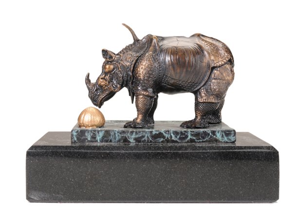 After Salvador Dali: (Spanish, 1904-1989) Standing Rhinoceros, bronze, cast signature "Salvador Dali" and inscribed "24/299", 4-1/2 x 6 in., with black marble base, modern casting, 6-1/2 x 9 in., excellent condition Prove