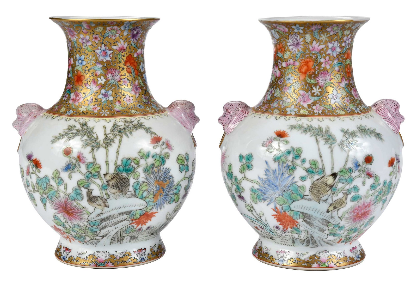Pair of Chinese Famille Rose Gilt Enameled Porcelain Vases: both with iron red reign mark of the Qianlong emperor, bulbous bodies with short necks and flared rims, dog head mask handles, pheasants amongst foliage, gilt and floral decoration on neck and at foot