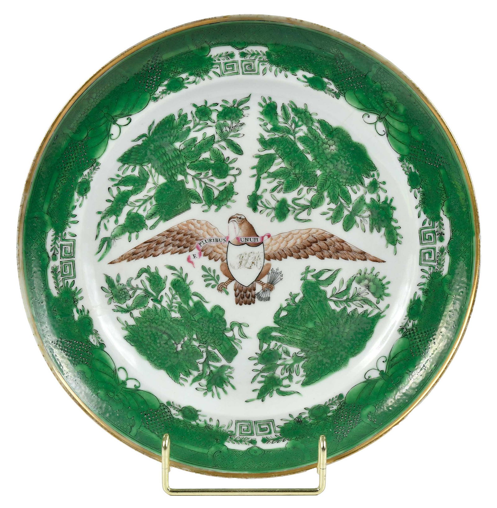 Chinese Export Armorial Porcelain Plate, for the American Market: early 19th century, green Fitzhugh border and sprays centering American eagle with motto "E Pluribus Unum" banner and shield with monogram "JLH(?)", gilt rim, 1 x 9-7/8 in. diameter Provenance: Accord