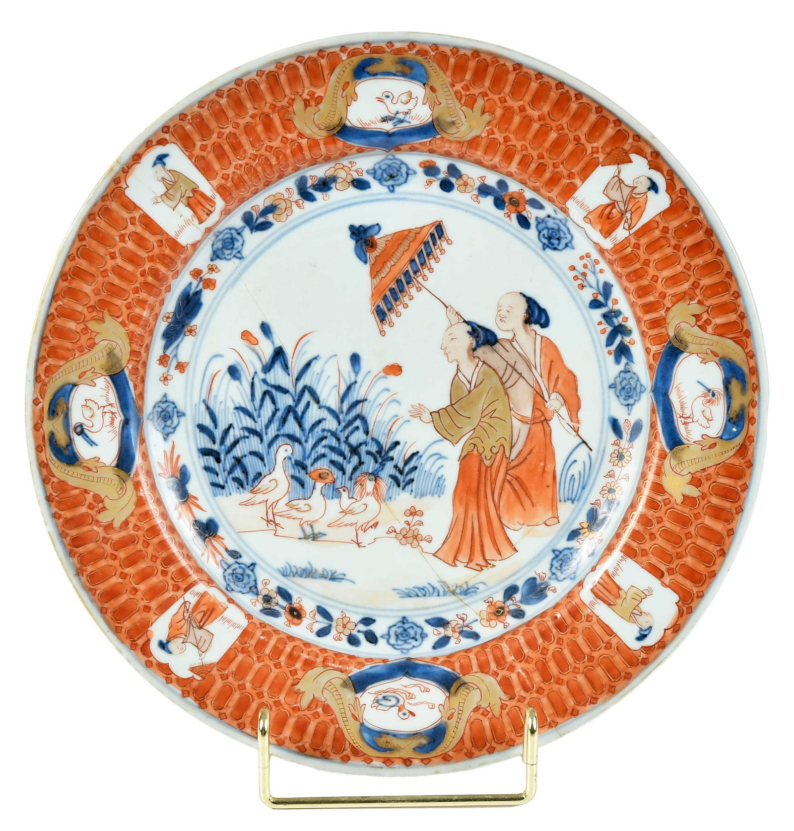 Chinese Export Imari 'Pronk Dame au Parasol' Porcelain Plate: Qing dynasty, after a design by Dutch artist Cornelis Pronk for the Dutch East India Company, depicting a lady at the waterside, with servant holding a parasol, with birds, underglaze blue insects to 