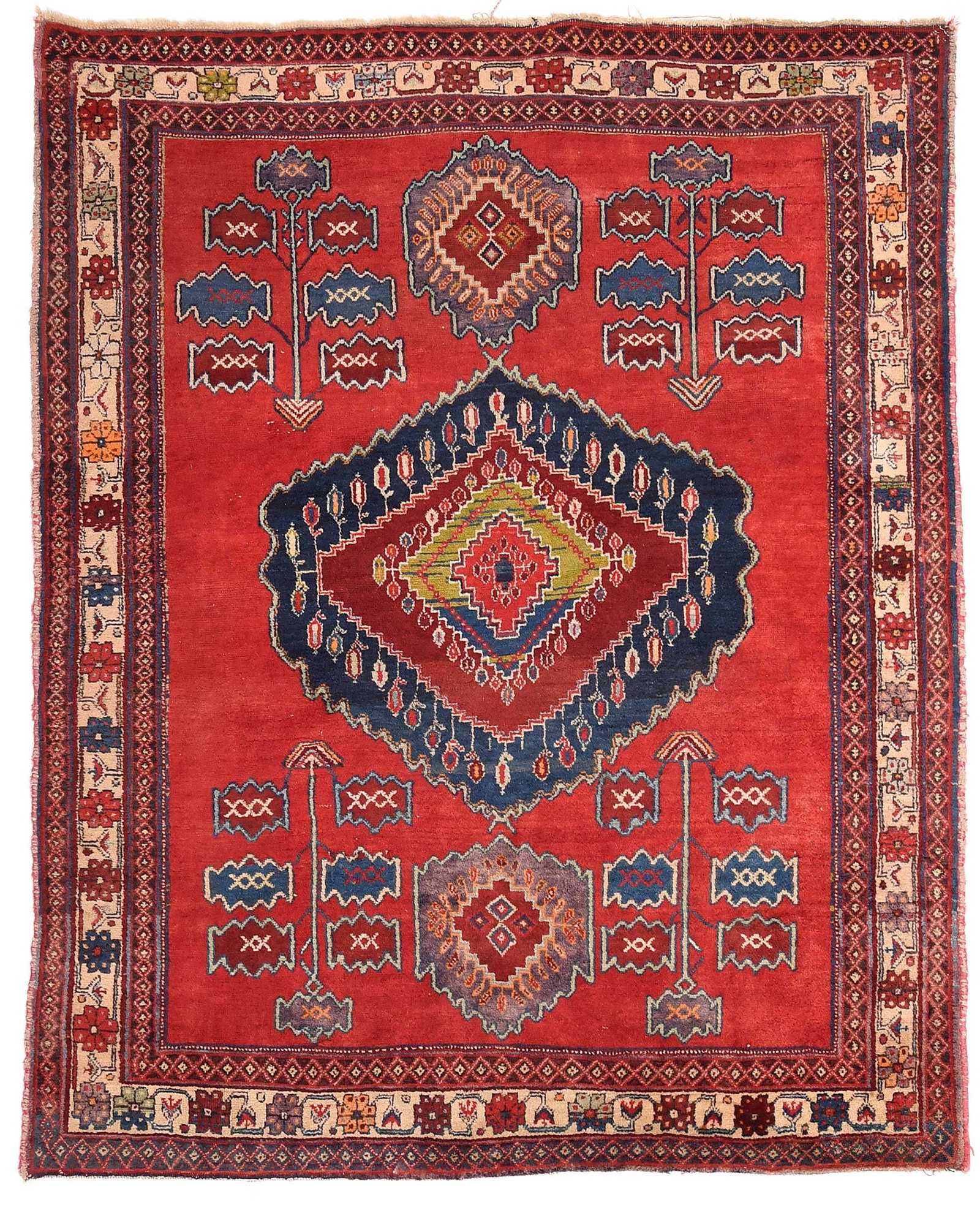 Persian Tribal Carpet: 20th century, red field, central medallion with hanging boteh, tree of life in four corners of field, white vine and floral border, 5 ft. 7 in. x 4 ft. 6 in. Provenance: Collection of JoAnn and Whit W