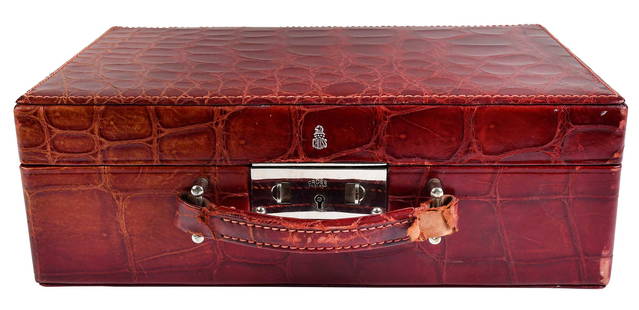 Mark Cross Burgundy Crocodile Train Case: England, 20th century, suede interior with removable tray, initialed "E.B.B" on exterior, 8 x 12-1/4 x 4-1/4 in. Provenance: Private Collection, North Carolina