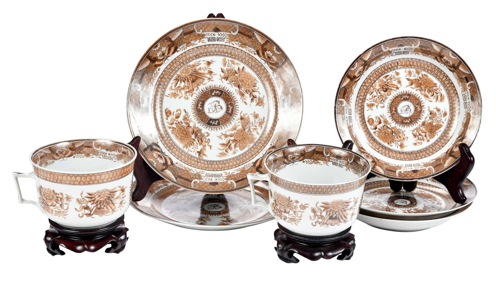 Seven Piece Chinese Export 'Brown Fitzhugh' Porcelain Set: Qing Dynasty, Jiaqing period, circa 1810-1820, each monogrammed with the initial "B", comprising two side plates, two large cups, and three saucers, plate 7-1/2 in. diameter, with associated stands Pr