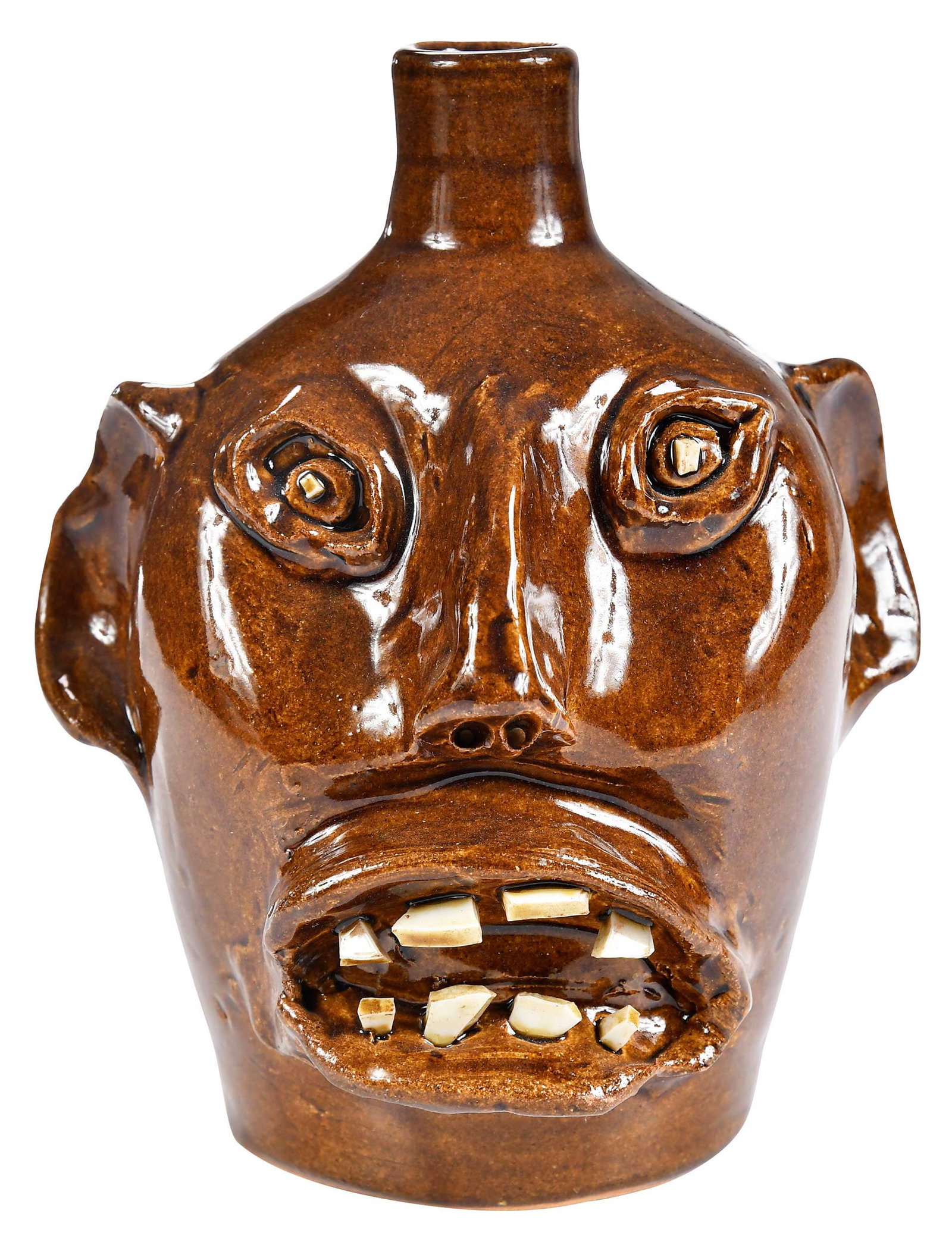 Evan Javan Brown Jr. Stoneware Face Jug: (Arden, North Carolina, 1923-2002) circa 1975, brownish secret formula glaze, slight purple iridescent sheen, applied facial features, inset broken porcelain pupils, broken china teeth, stamped "E.J. 