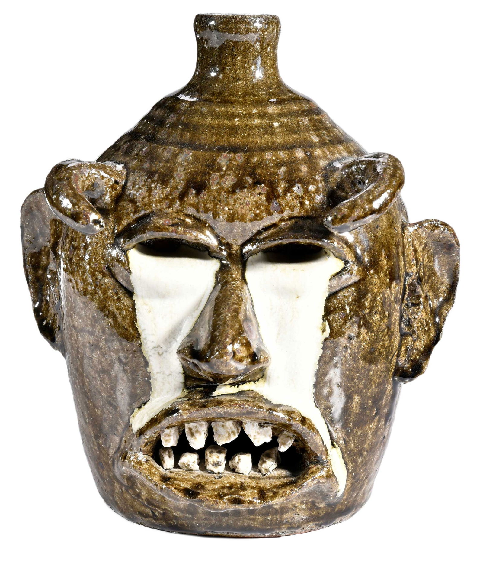 Rare and Important Lanier Meaders Devil Jack-O-Lantern Face Jug: (Mossy Creek, White County, Georgia, 1917-1998) 1971, jug form, runny olive green alkaline ash glaze, kaolin runs down from eye sockets to protruding lips around mouth, inset rock teeth, applied downt