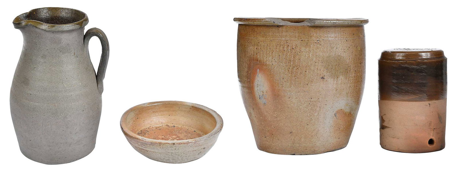 Four Pieces of Southern Stonewares: southern milk pail, salt glaze exterior, Albany slip glazed interior, incised line at shoulder, flat rim, chatter marks to body, possibly Georgia, Alabama, or Tennessee, 9-3/4 in.; pitcher, salt glaze