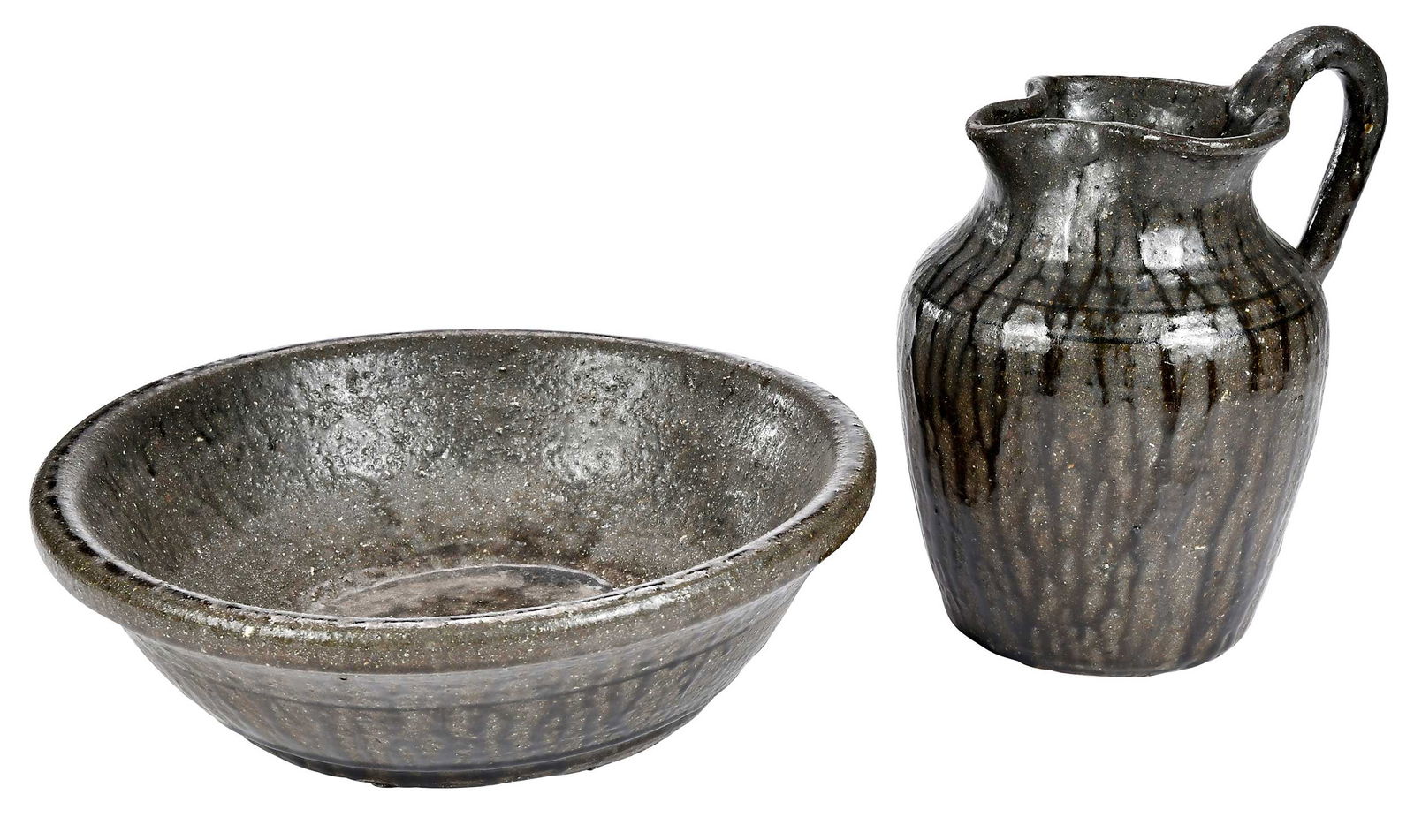 Lanier Meaders Georgia Stoneware Pitcher and Bowl Wash Stand Set: (Mossy Creek, White County, Georgia, 1917-1998) both with runny green ash glaze, wide tapered center bowl, thick rounded rim, 4 x 13-1/2 in.; short tapered body pitcher, high arching strap handle, pul