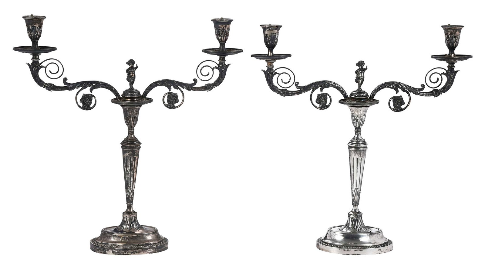 Pair of Dutch Silver Candelabra: Netherlands, each with two scroll arms and foliate decoration, central putti figure, oval bases, marks for Netherlands, .833 fine, 75.79 oz. T. gross weight, 17 x 16 in.; with later wiring and four ca