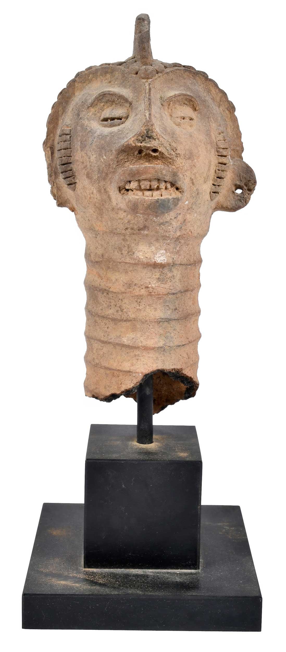 Eket Attributed Terracotta Head: Ghana, depicting head with elongated, ringed neck, on modern mount, fragment 9-1/2 x 5-1/2 x 5-1/4 in.,13 x 5 in. with mount Provenance: Xanadu Gallery, San Francisco, California, 1987, $529.57 (