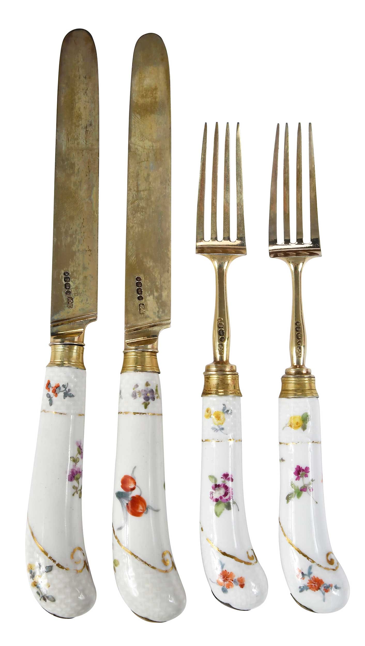 24 Piece Cased George IV English Silver and Porcelain Flatware: London, 1821, gilt silver blades and tines with marks for Richard Poulden, ceramic pistol grips with gilt and floral decoration, 6-3/4 in. forks, and 8-3/8 in. knives; in a fitted wooden case