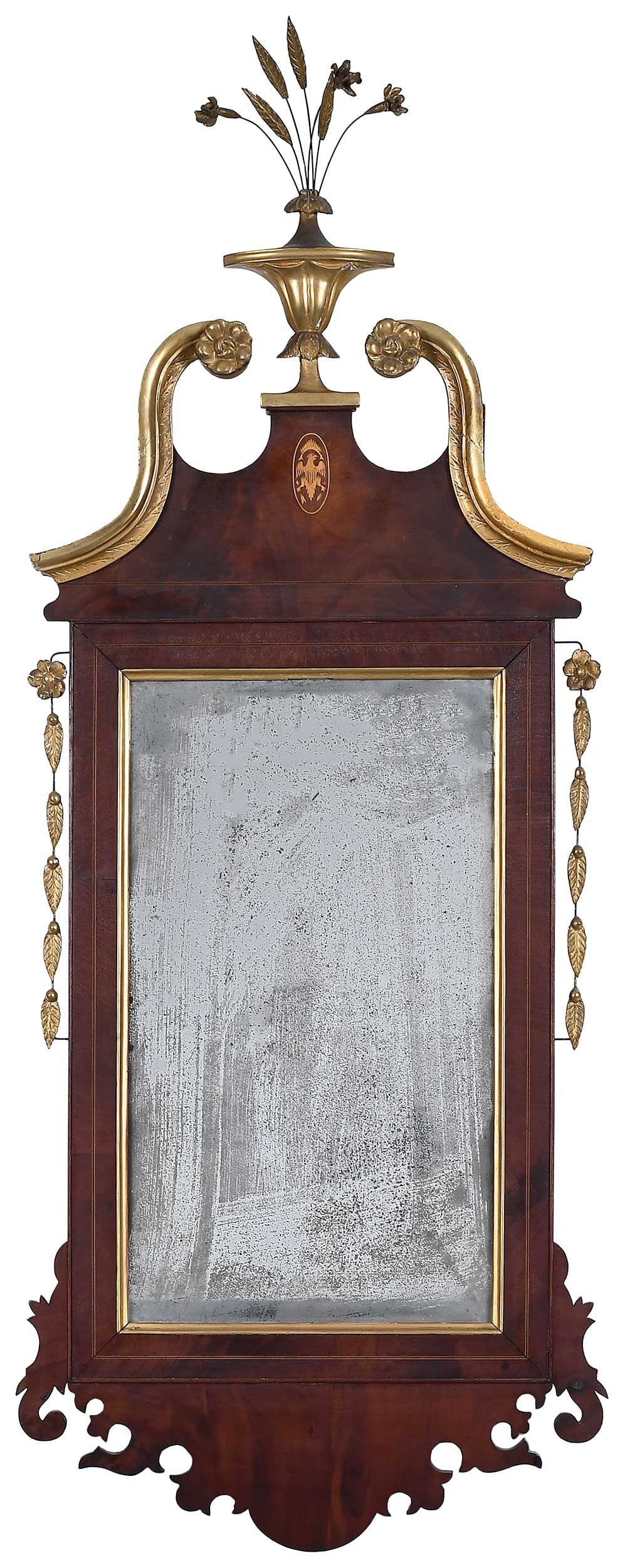 American Federal Carved Parcel Gilt and Eagle Inlaid Mirror: 19th century, possibly period, label verso for "Edgar A. Goss, gilder, antique mirrors restored... Hartford, Conn.", with scrolled pediment and urn and wheat sheaf ornament, eagle inlay, dis