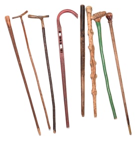Eight Assorted Carved Folk Art Canes and Walking Sticks